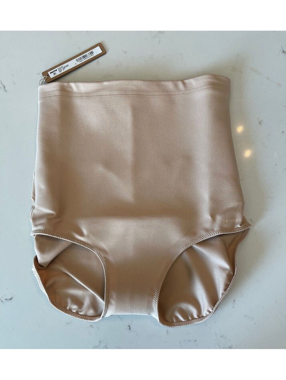 Skims Shapewear core sculpt butt lifting brief in Clay, Size S - NWT